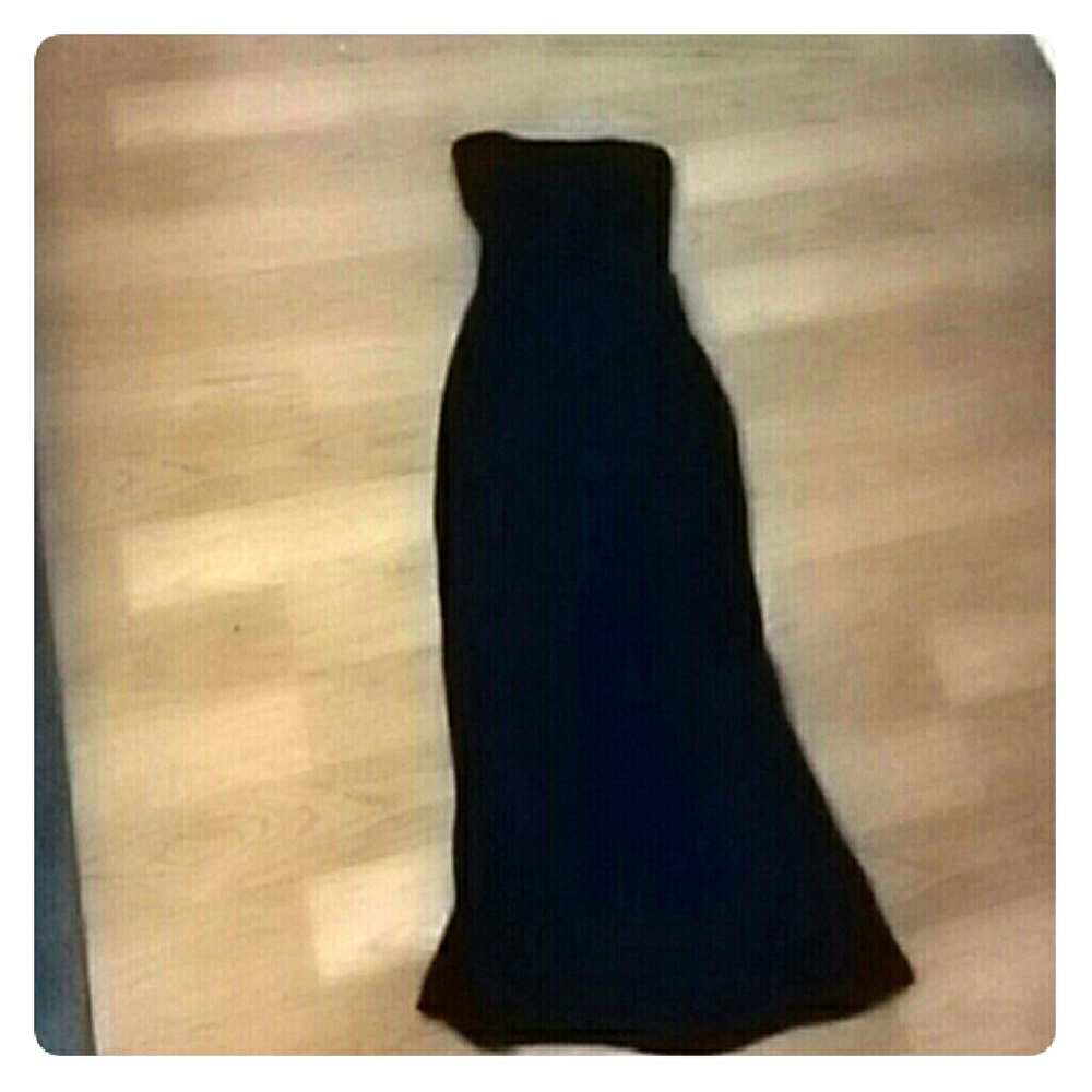 Black dress bottom half is see through